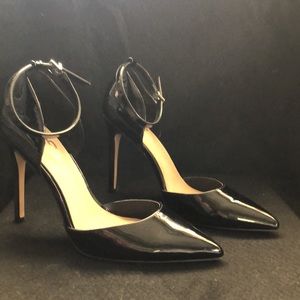Sexy black patented leather heels w/ ankle strap.